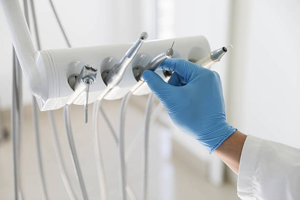 Professional Tooth Extraction technician working in Shadeland, IN